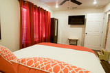 Master bedroom with tv