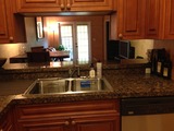 View of living room through kitchen