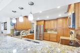 Beautiful updated kitchen at the hub of the home