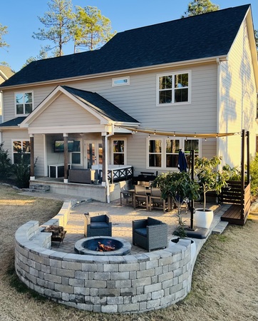 Entertaining patio with fire pit and TV
