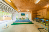 Suburban garage retreat with games