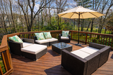 Cozy outdoor deck with tropical accents