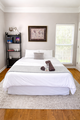 Serene daytime bedroom with a cozy ambiance