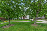 415 st vincent st 30   front of home with trees