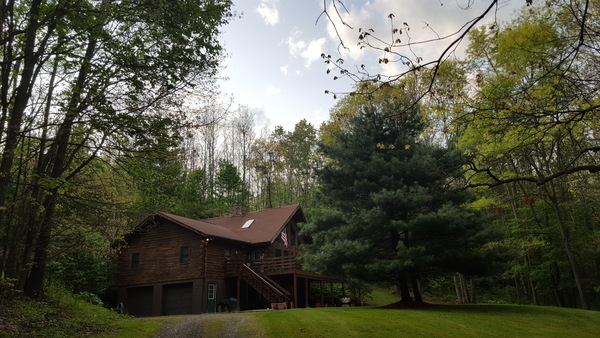 Log Home in beautiful wooded setting
